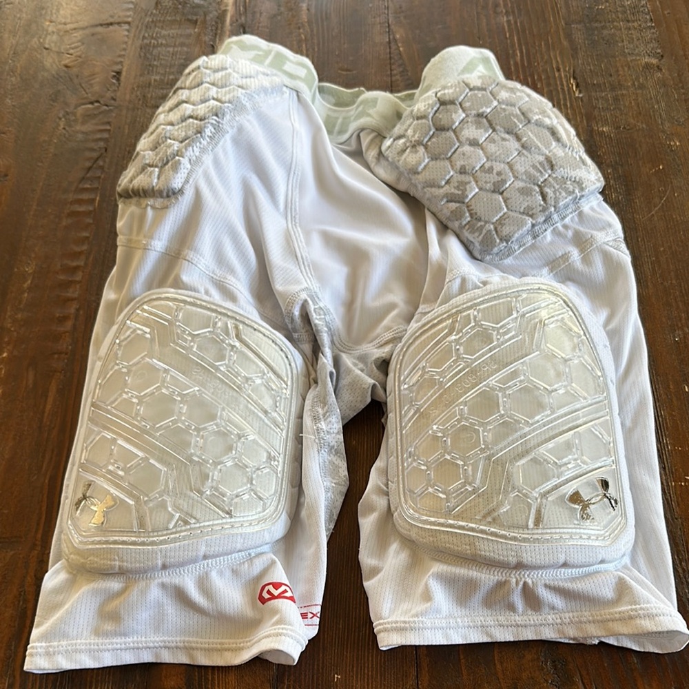 Under Armour White Padded football Shorts with Intricate Design